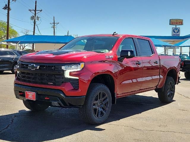 2026 Chevrolet Silverado 1500 LT Trail Boss in Radiant Red Tintcoat — front three-quarter view